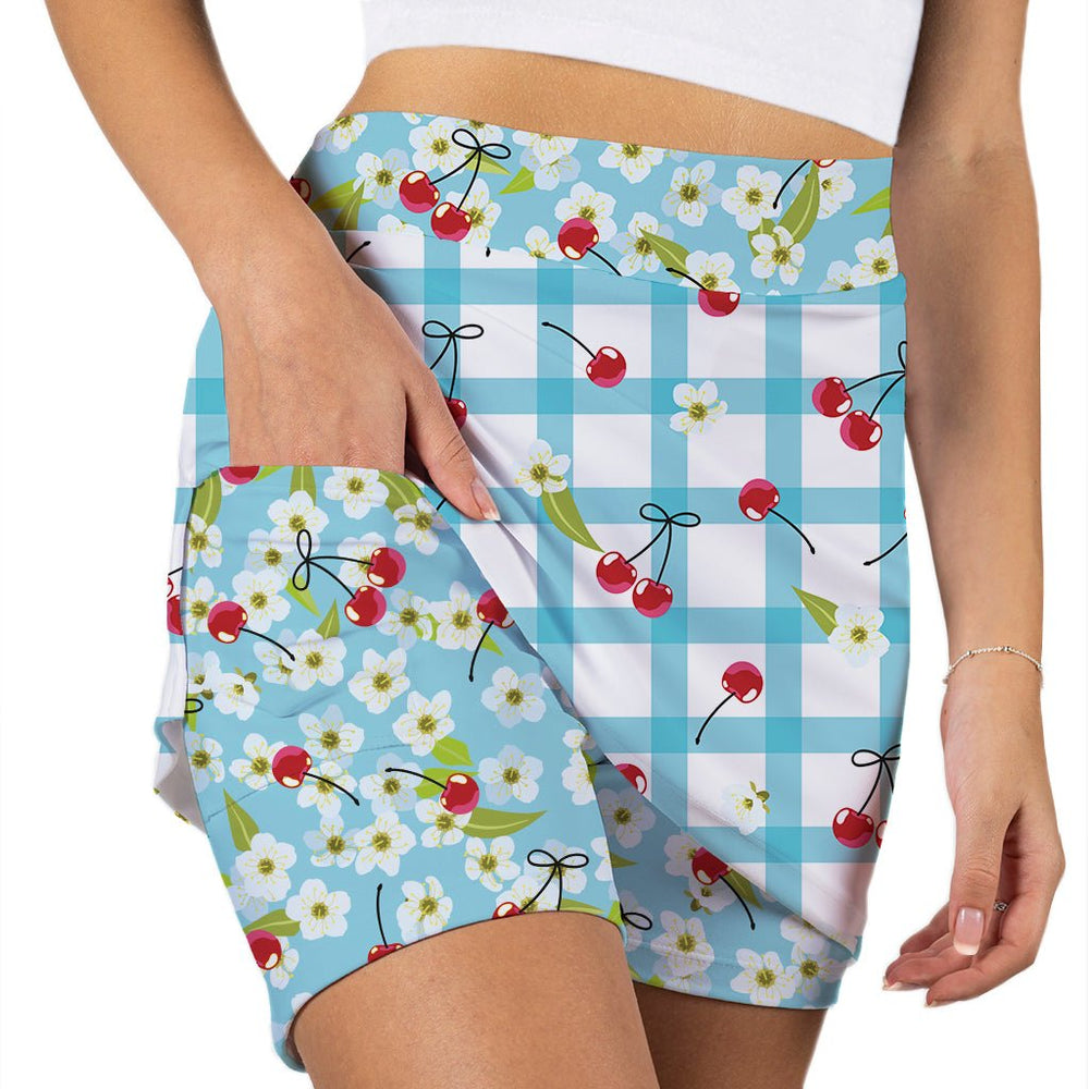 Skirt with cherry and checkered pattern on a white background