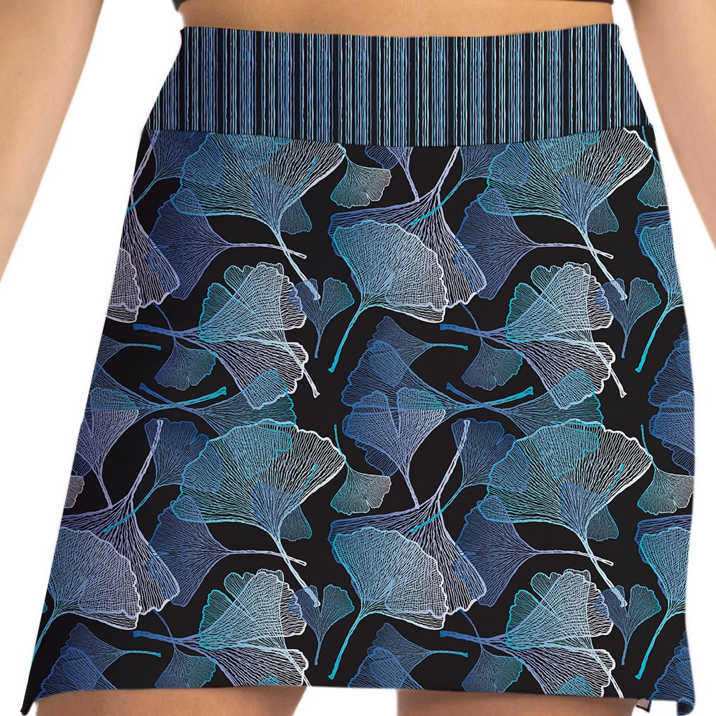 Skirt with blue leaf pattern on a black background