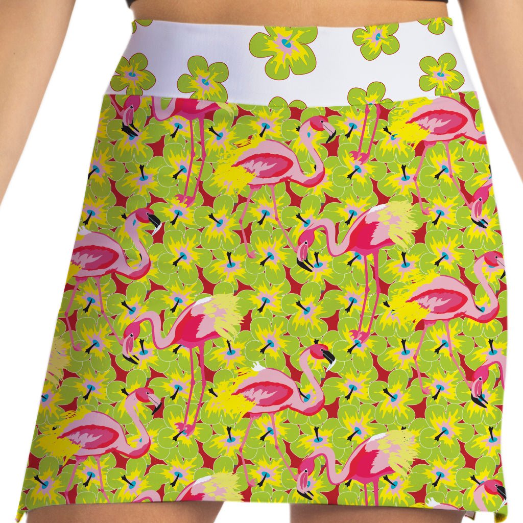 Skirt with pink flamingo and green leaf pattern on a white background