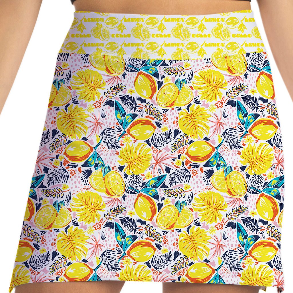 Skirt with a colorful lemon and leaf pattern on a white background