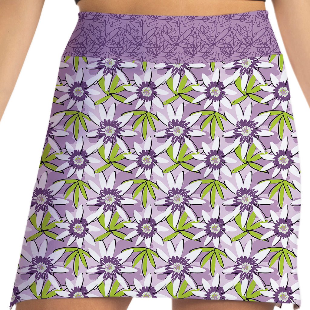 Skirt with a purple floral pattern on a white background