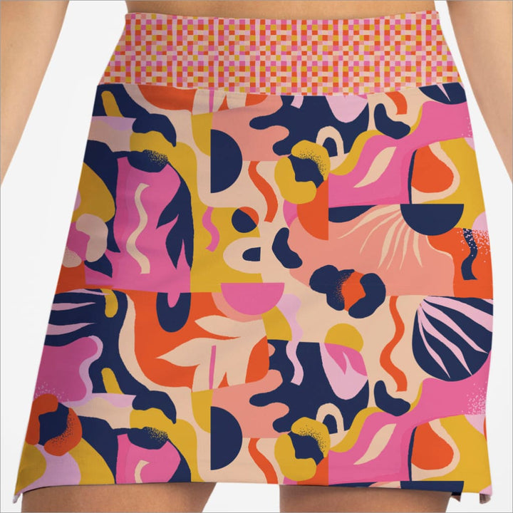 Colorful abstract patterned skort on a plain background