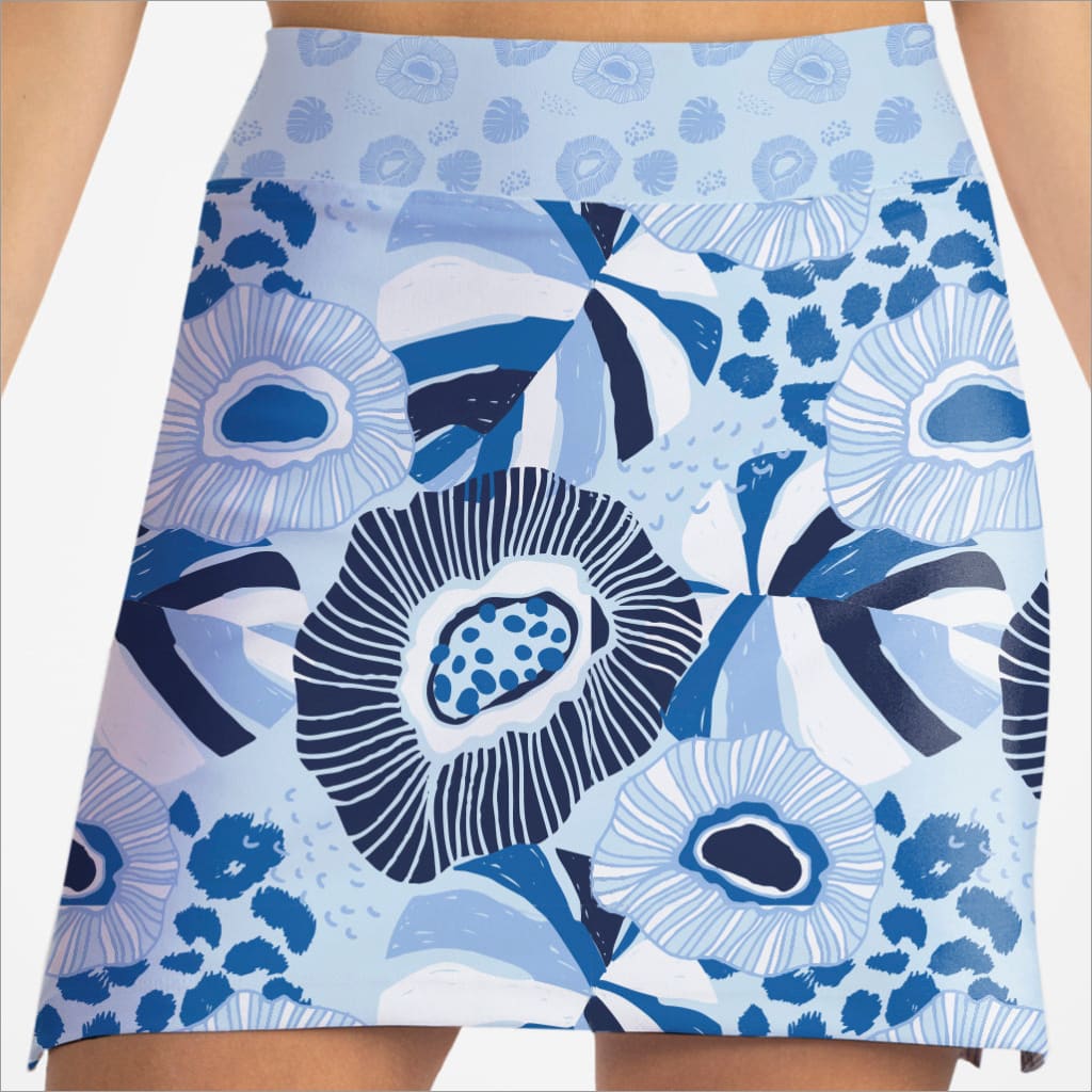 Skort with blue and white floral pattern on a person wearing it.